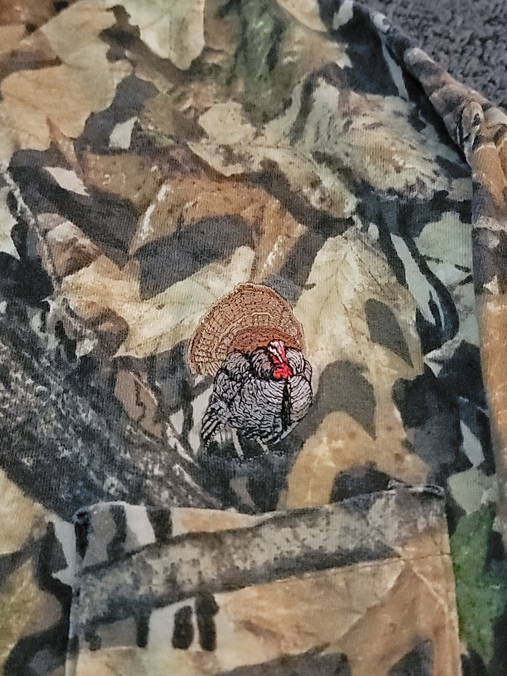 Mossy Oak Camo Shirt with Orange Logo Accent